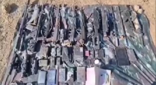 Irak'ın kuzeyinde PKK'lı teröristlere ait çok sayıda silah ve malzeme ele geçirildi